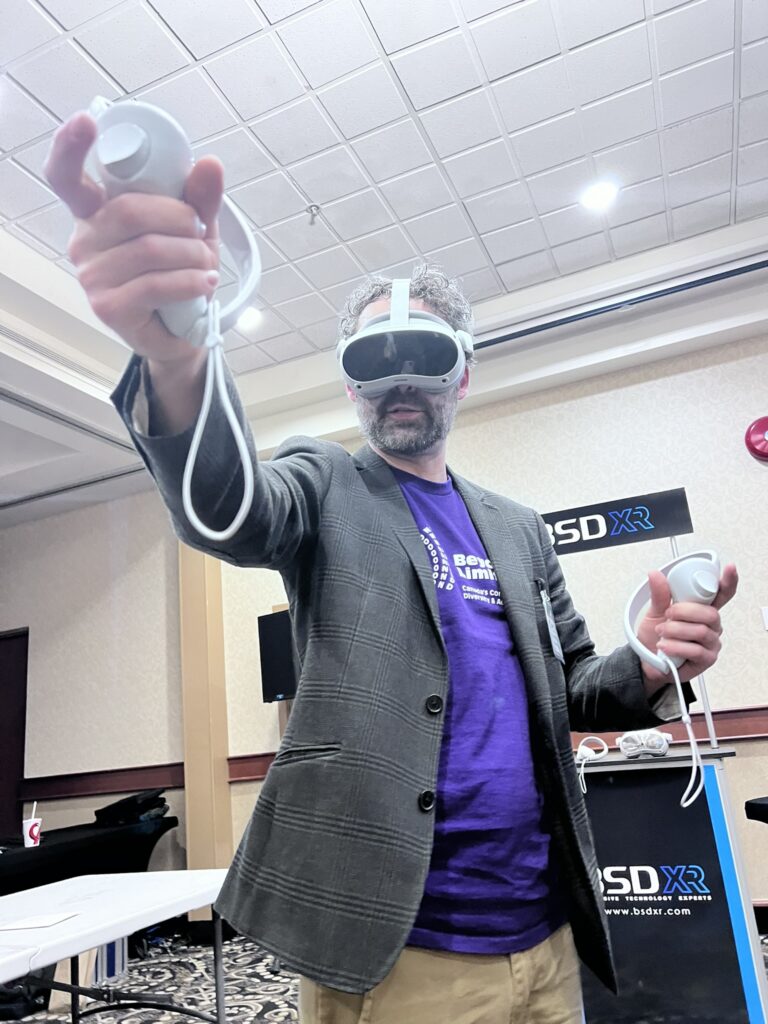 Man wearing Virtual Reality headset holding and pointing a controler